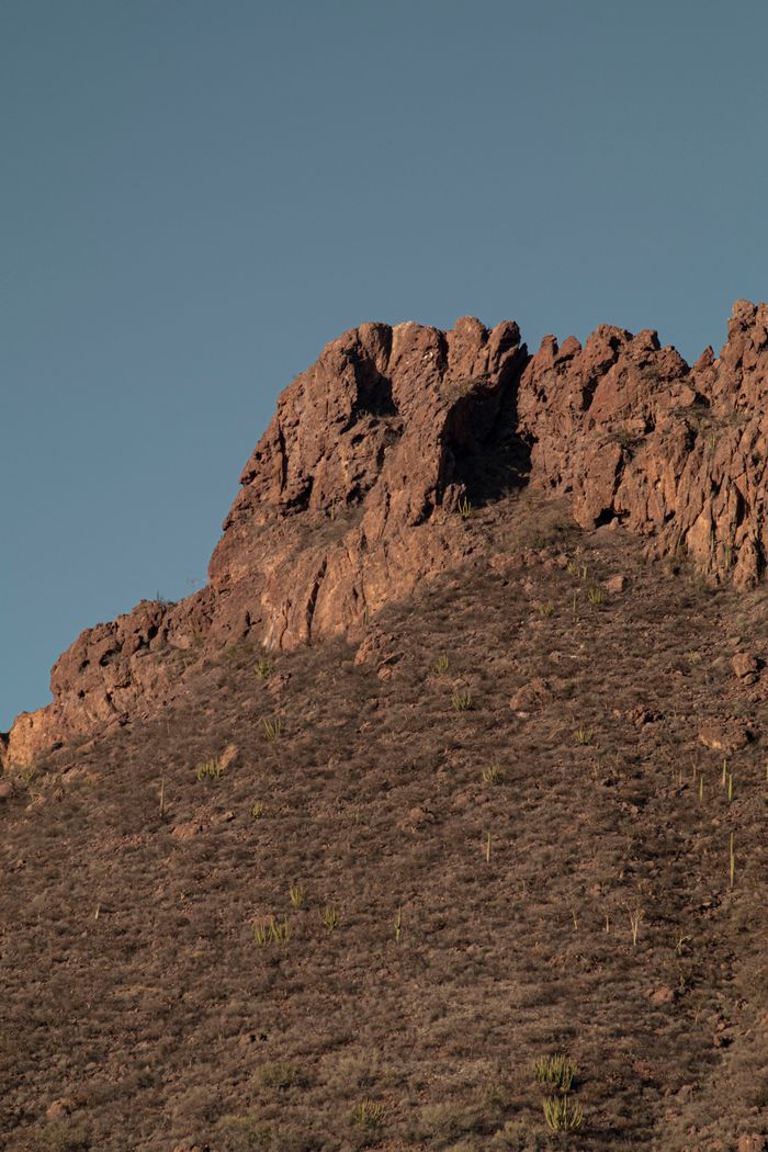 Explore the rugged beauty of San Carlos rock formations under a clear sky.
